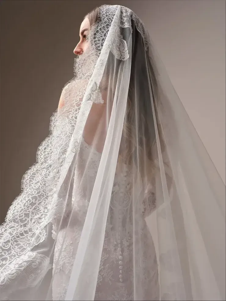 Bride in Chantilly lace gown